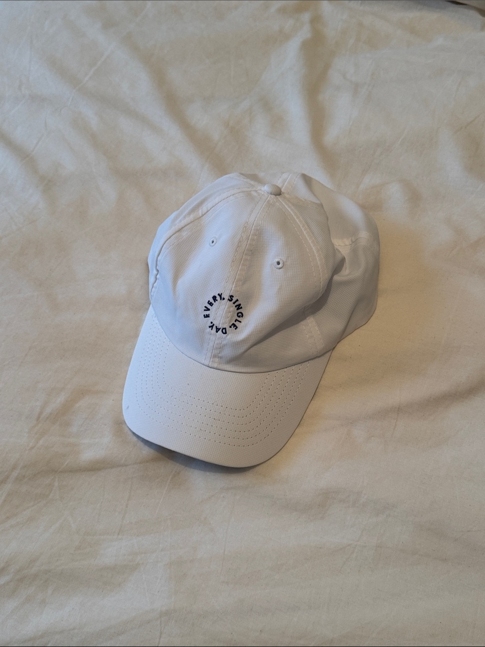 Supergoop! White Baseball Cap with Circular Logo